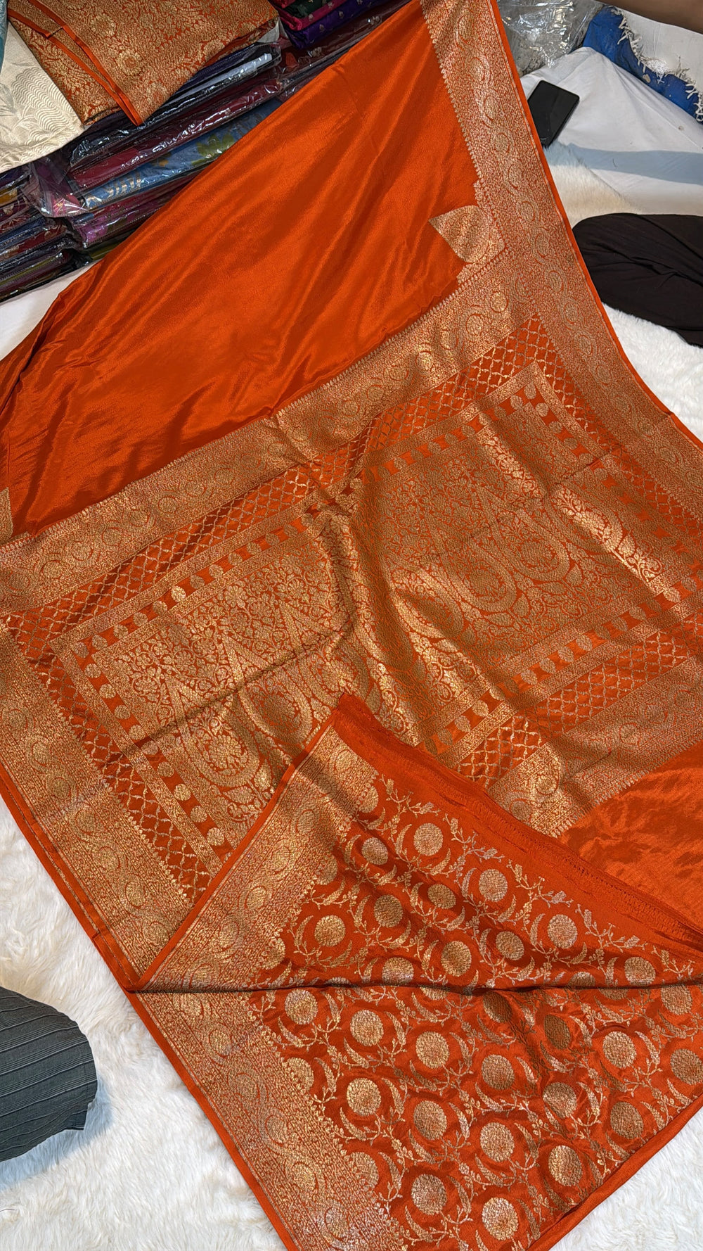 Pure Banarasi Khaddi Crape Silk Handloom Saree with Traditional Corners Rust Orange Color