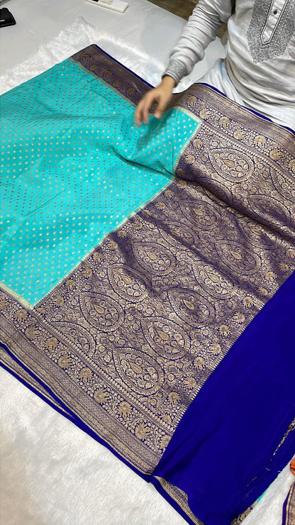Pure Banarasi Khaddi Crape Silk Handloom Saree with Traditional Corners Firozi With Navy Blue