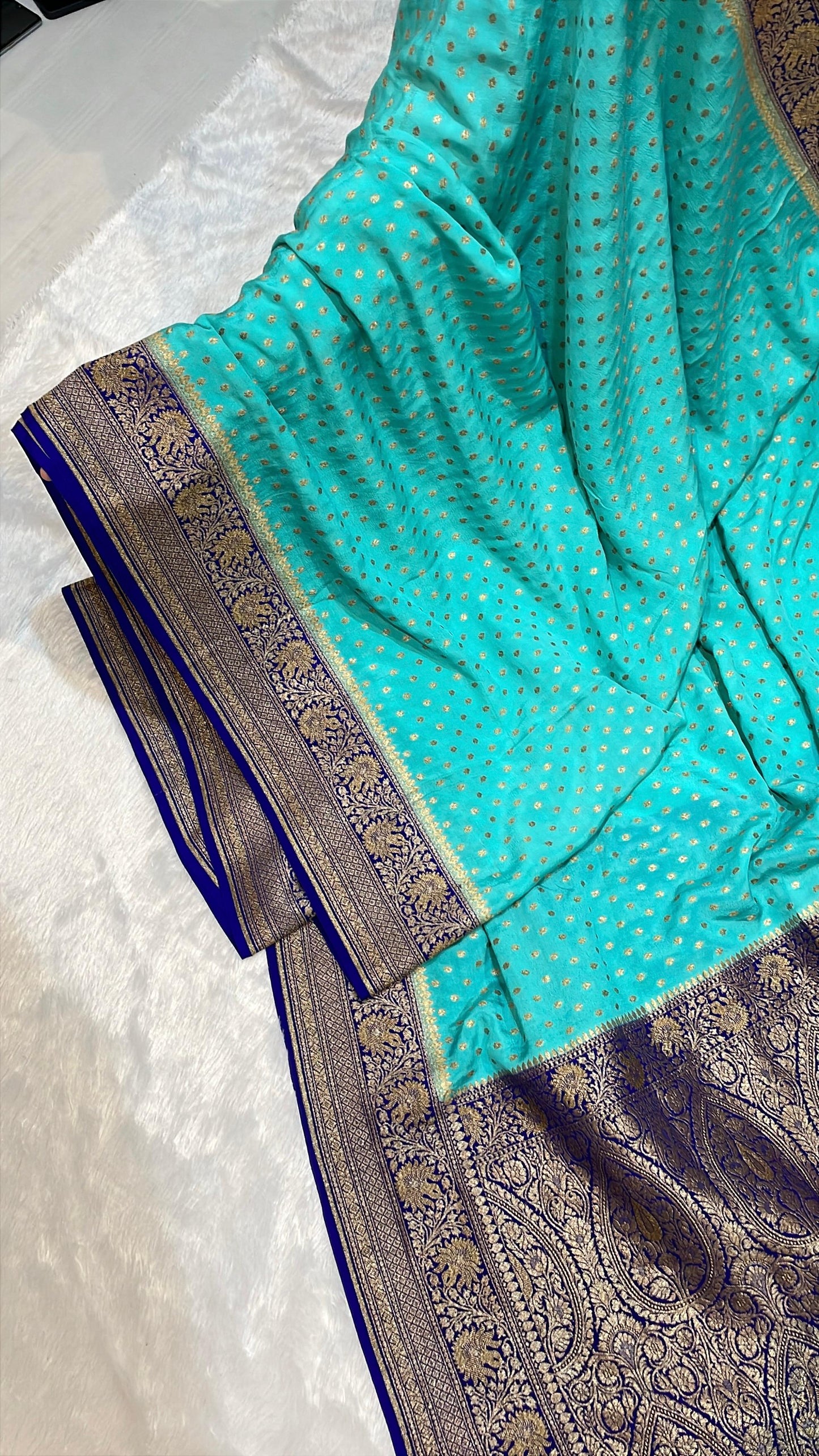 Pure Banarasi Khaddi Crape Silk Handloom Saree with Traditional Corners Firozi With Navy Blue