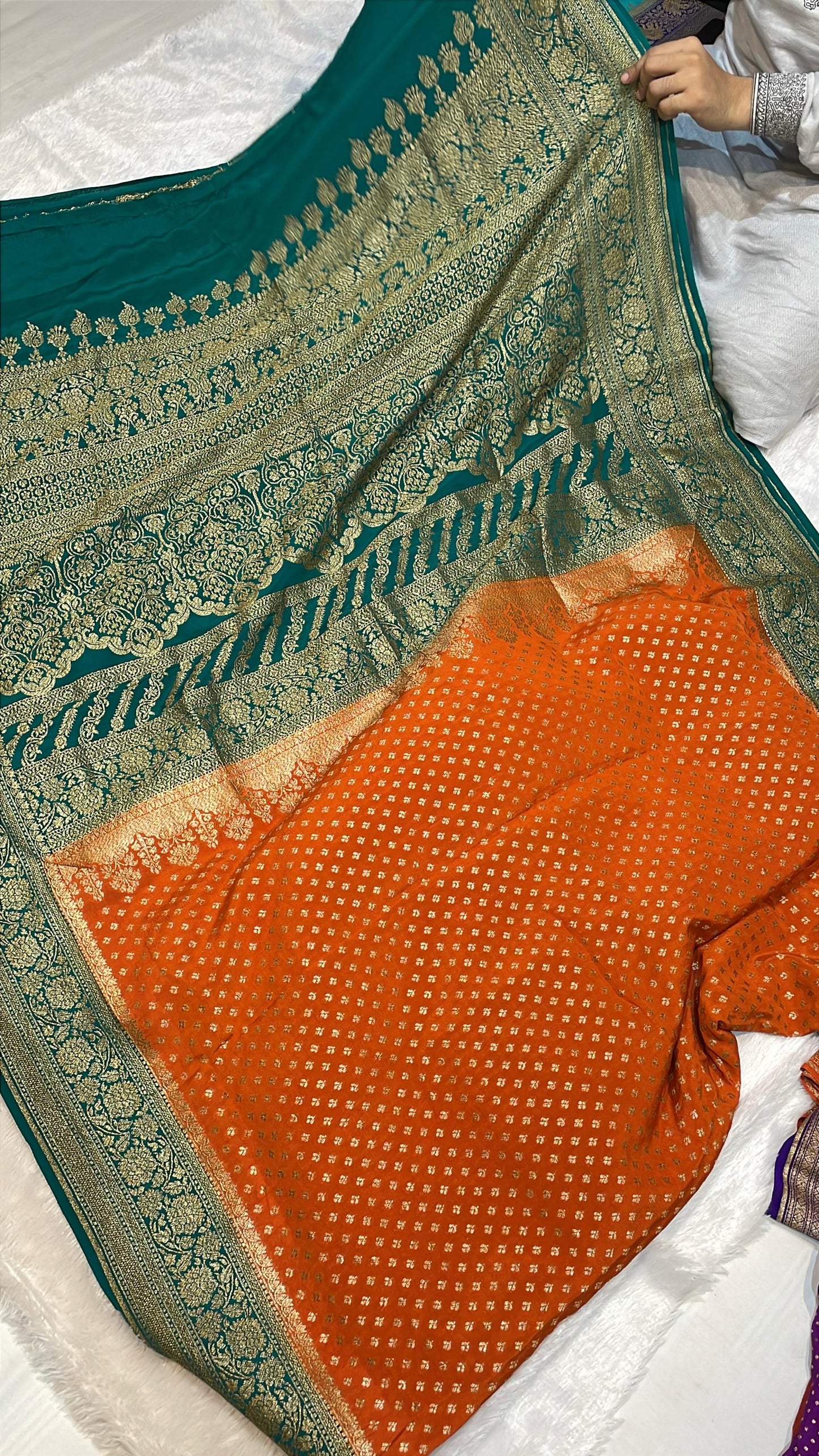 Pure Banarasi Khaddi Crape Silk Handloom Saree with Traditional Corners Orange With Green