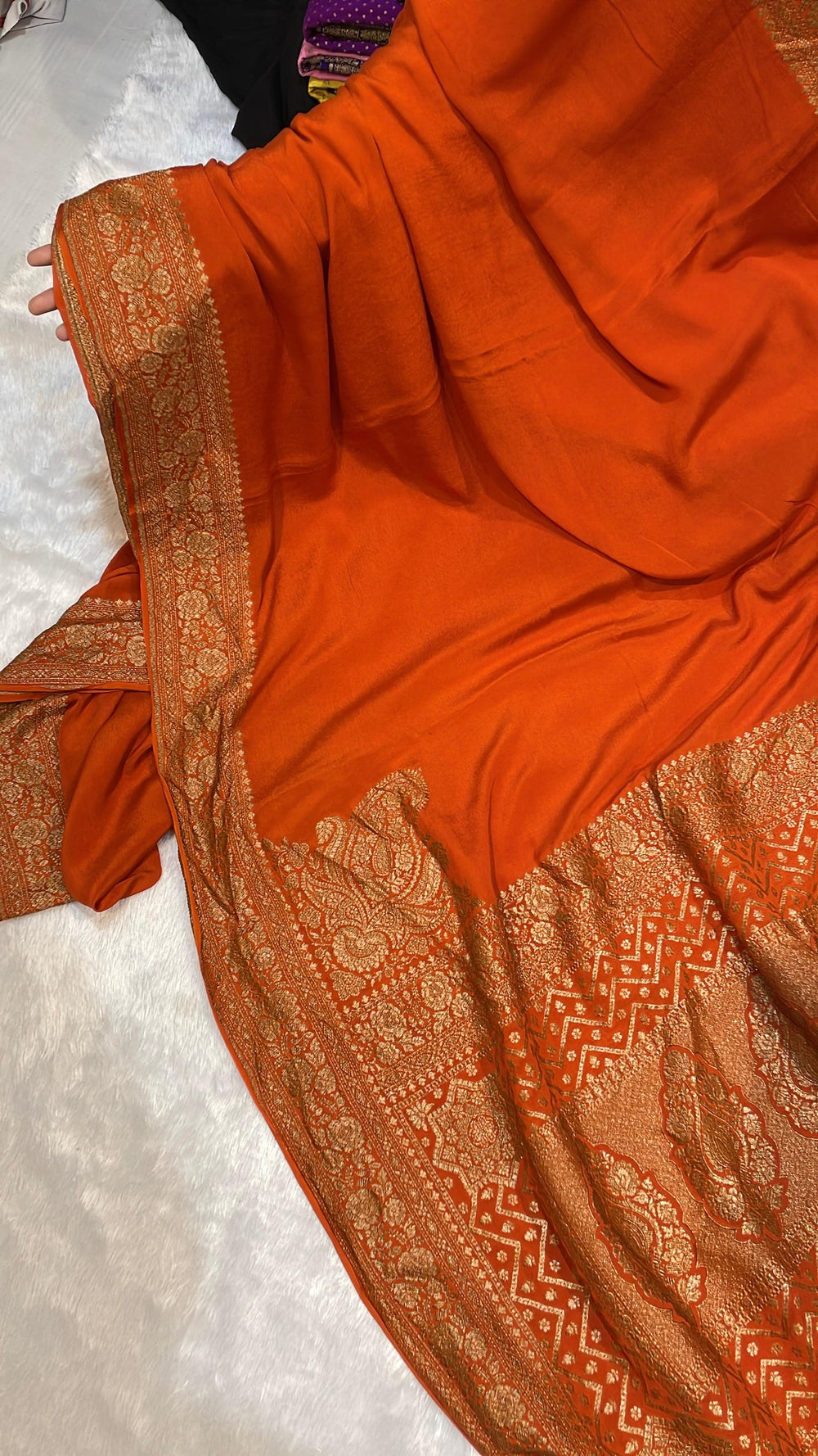 Pure Banarasi Khaddi Crape Silk Handloom Saree with Traditional Corners Rust Orange Color