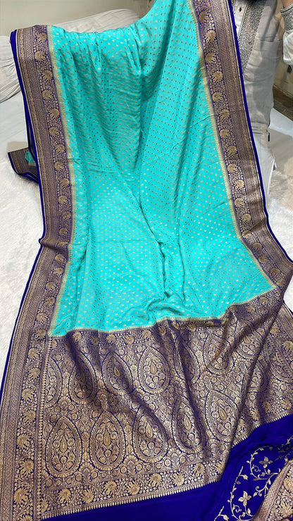 Pure Banarasi Khaddi Crape Silk Handloom Saree with Traditional Corners Firozi With Navy Blue